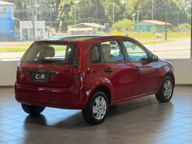 FORD - FIESTA - 2012/2013 - Vermelha - R$ 31.900,00